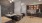 a room with a couch and tables