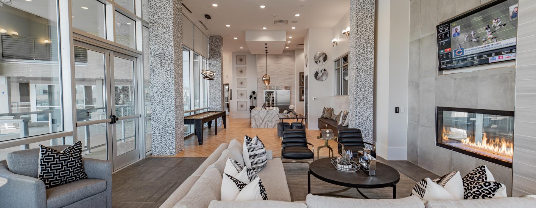 a large living room with a fireplace