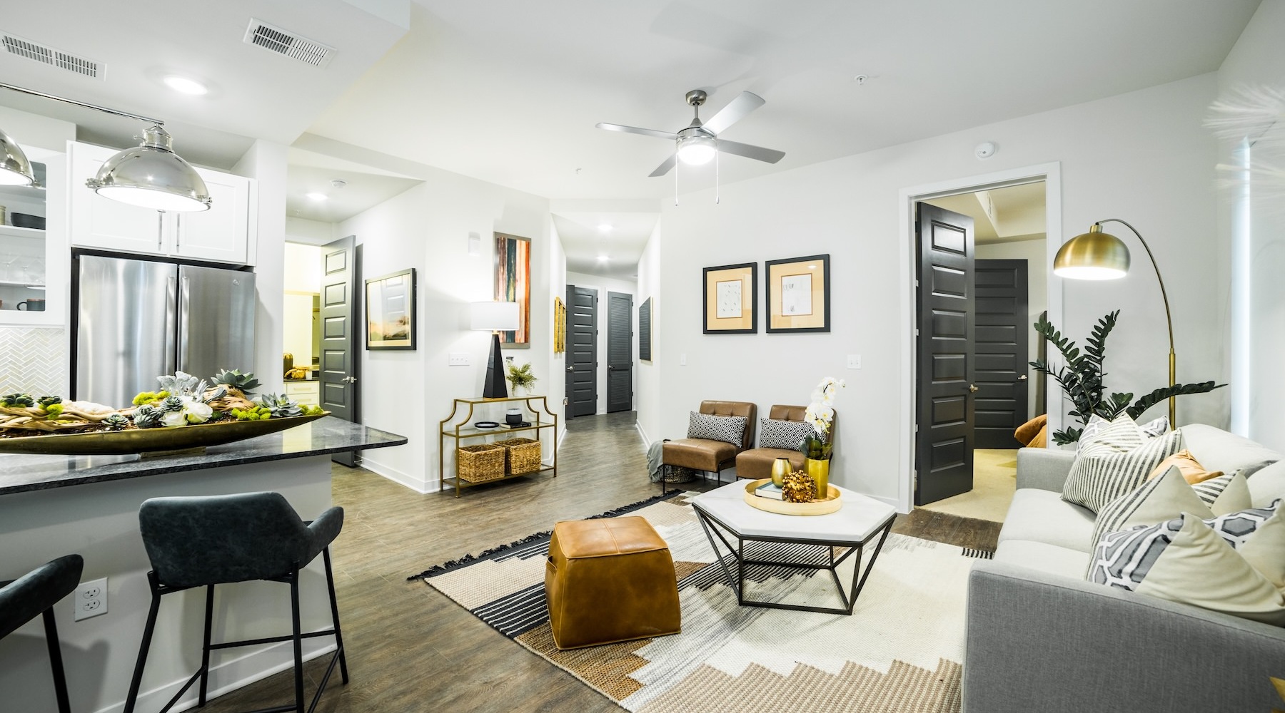 Wide open living areas perfect for entertaining living room with view of kitchen and enterance