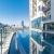 a pool of water between buildings