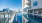 a pool of water between buildings