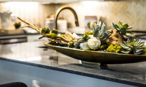 a kitchen with a table and chairs