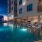 a pool with chairs around it