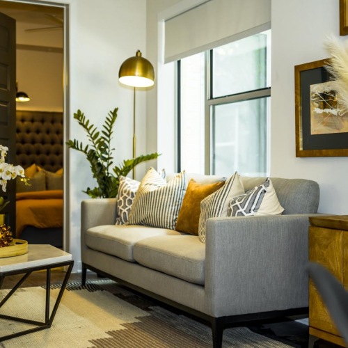 Beautiful living areas to match your lifestyle a living room with a couch and a table