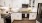 a kitchen with white cabinets