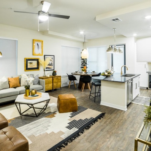 Gorgeous living areas to entertain and enjoy a living room with a rug and a table