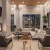 a living room with a tv and couches